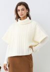 Warmth Turtleneck Cable Knit Cape Sweater in Ivory