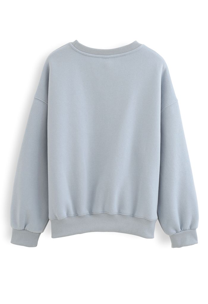 Amore Printed Fleece Sweatshirt in Blue