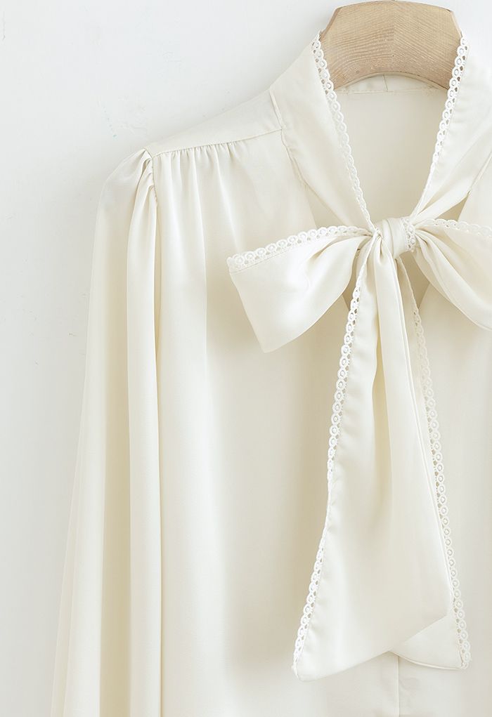 Lacy Edge Bowknot Textured Satin Top in Cream