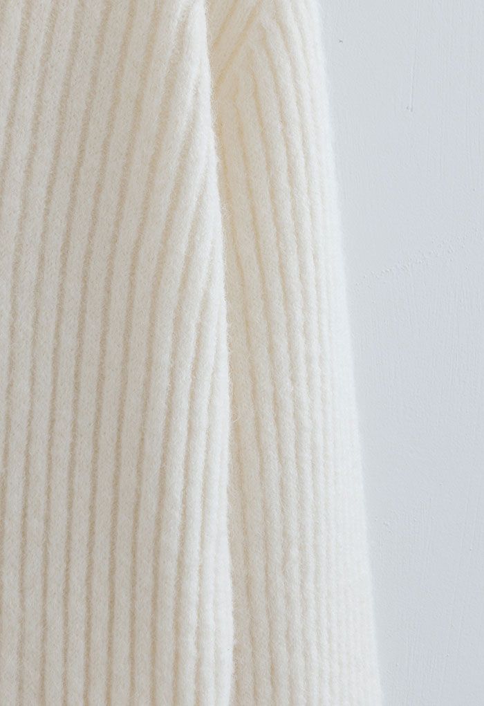 Turtleneck Asymmetric Split Hem Knit Sweater in Ivory