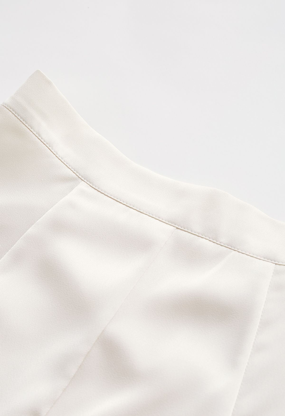 Asymmetric Hem Double Slit Satin Skirt in Cream