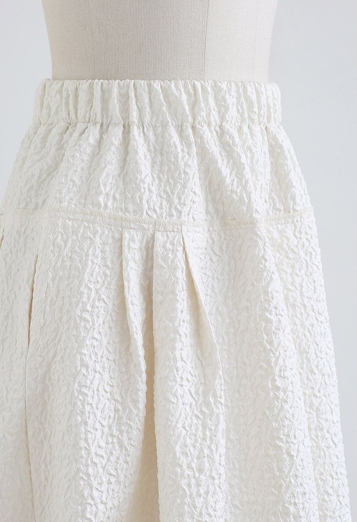 Side Pocket Pleated Embossed Midi Skirt in Cream