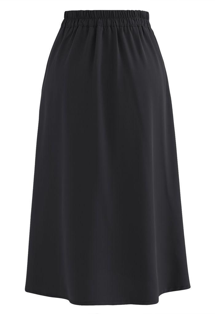 Four Buttons Decorated Pleated Skirt in Black