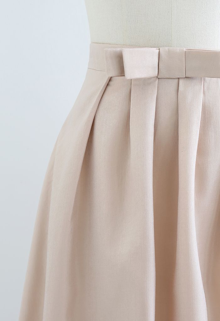 Glimmer Slim Bow Pleated Midi Skirt in Blush Pink