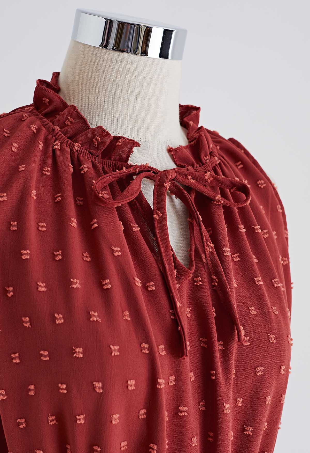 Tie-Neck Flock Dot Pleated Dress in Rust Red