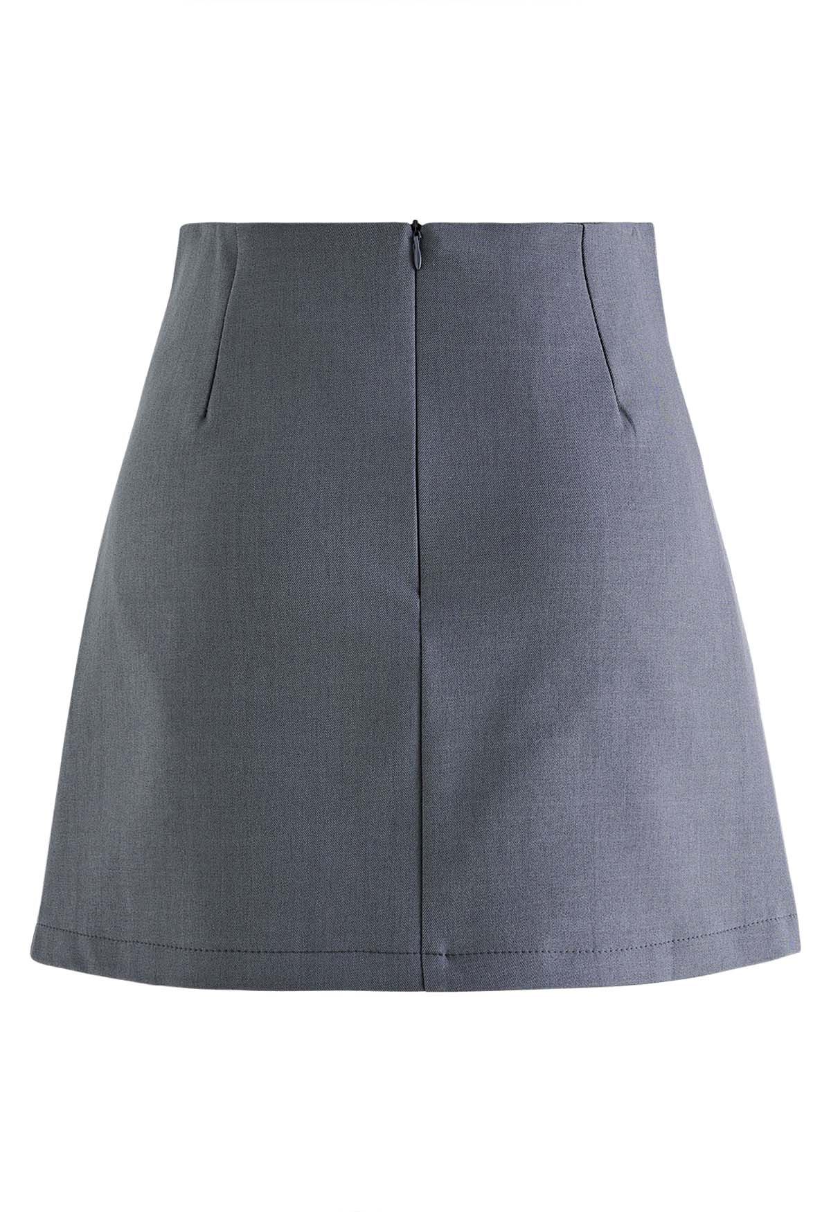 Twin Buttons Pleated Flap Mini Skirt in Grey