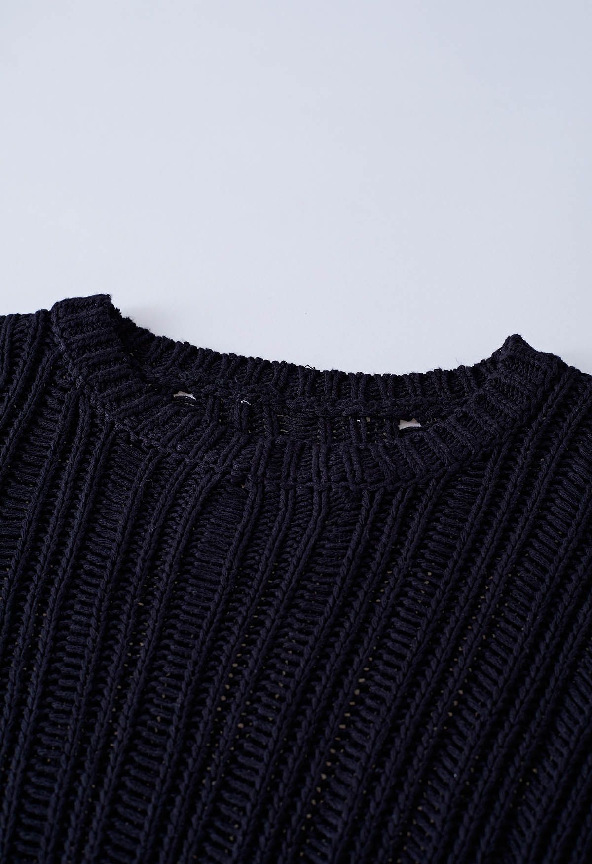 Side Slit Pointelle Knit Sweater in Black