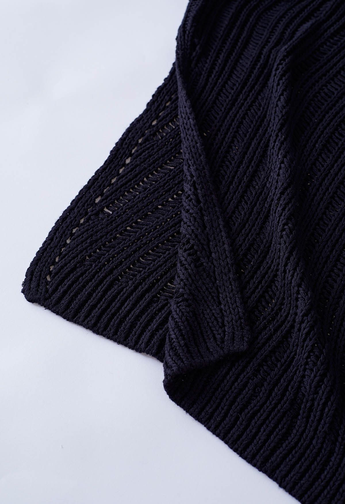 Side Slit Pointelle Knit Sweater in Black