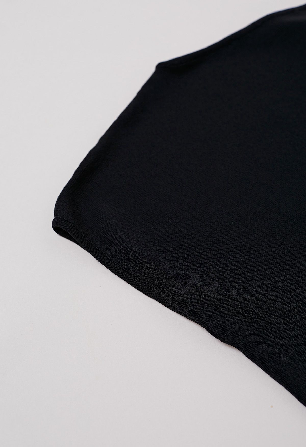 Asymmetric Folded Collar Knit Top in Black