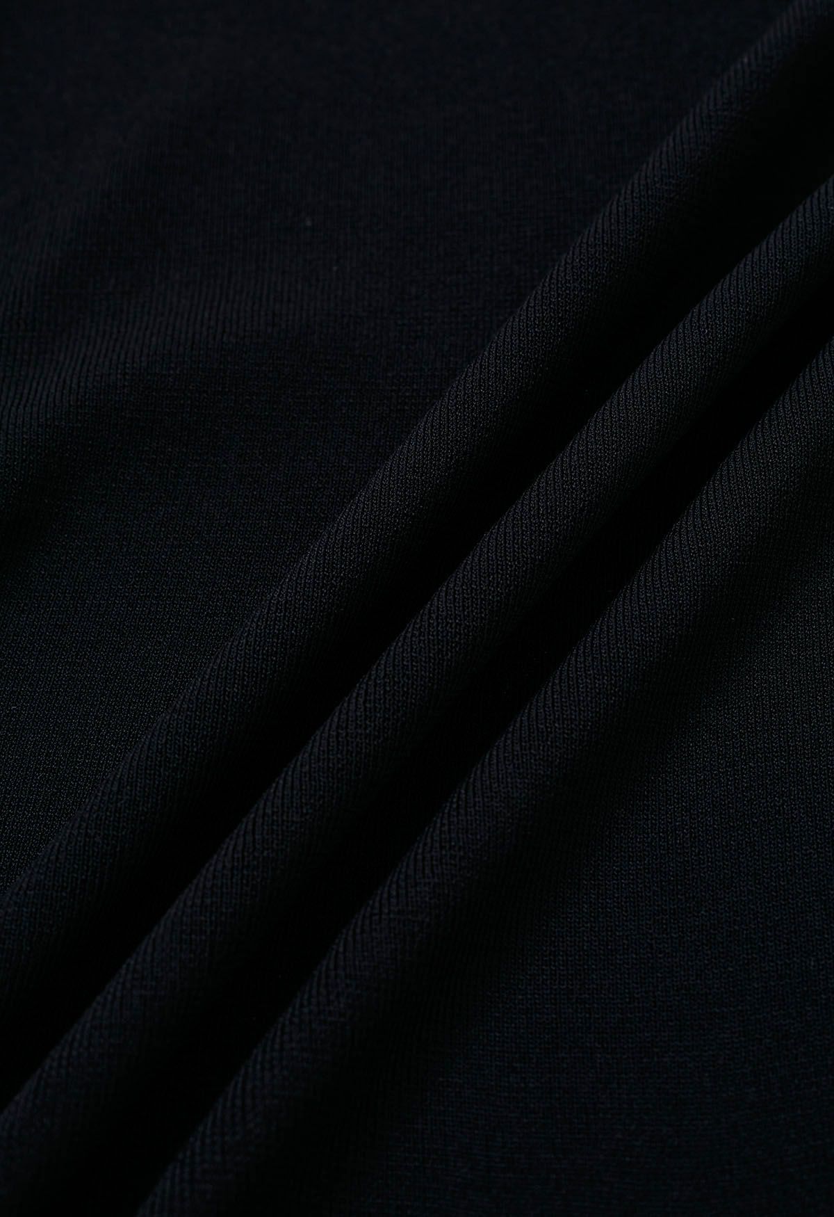 Asymmetric Folded Collar Knit Top in Black