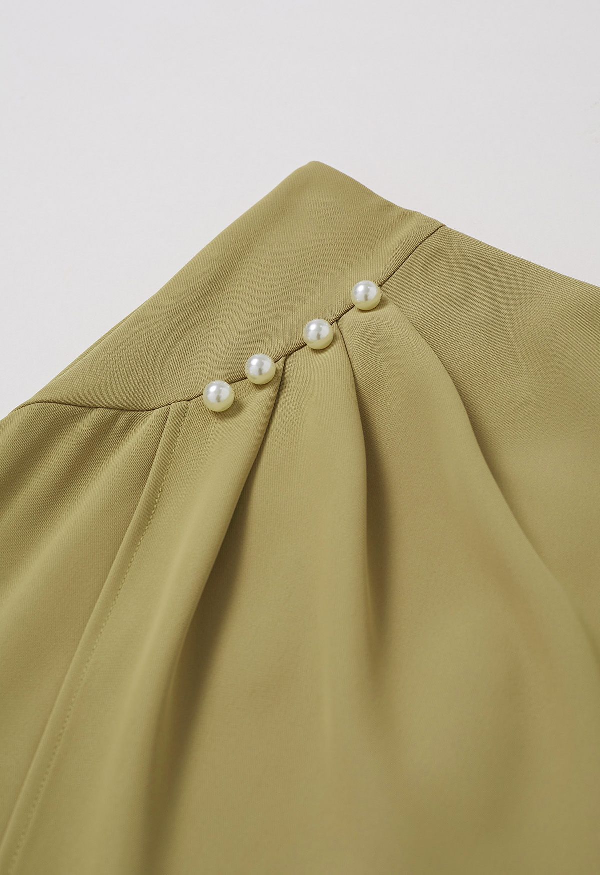 Pearl Side Pleats Asymmetric Flap Midi Skirt in Mustard