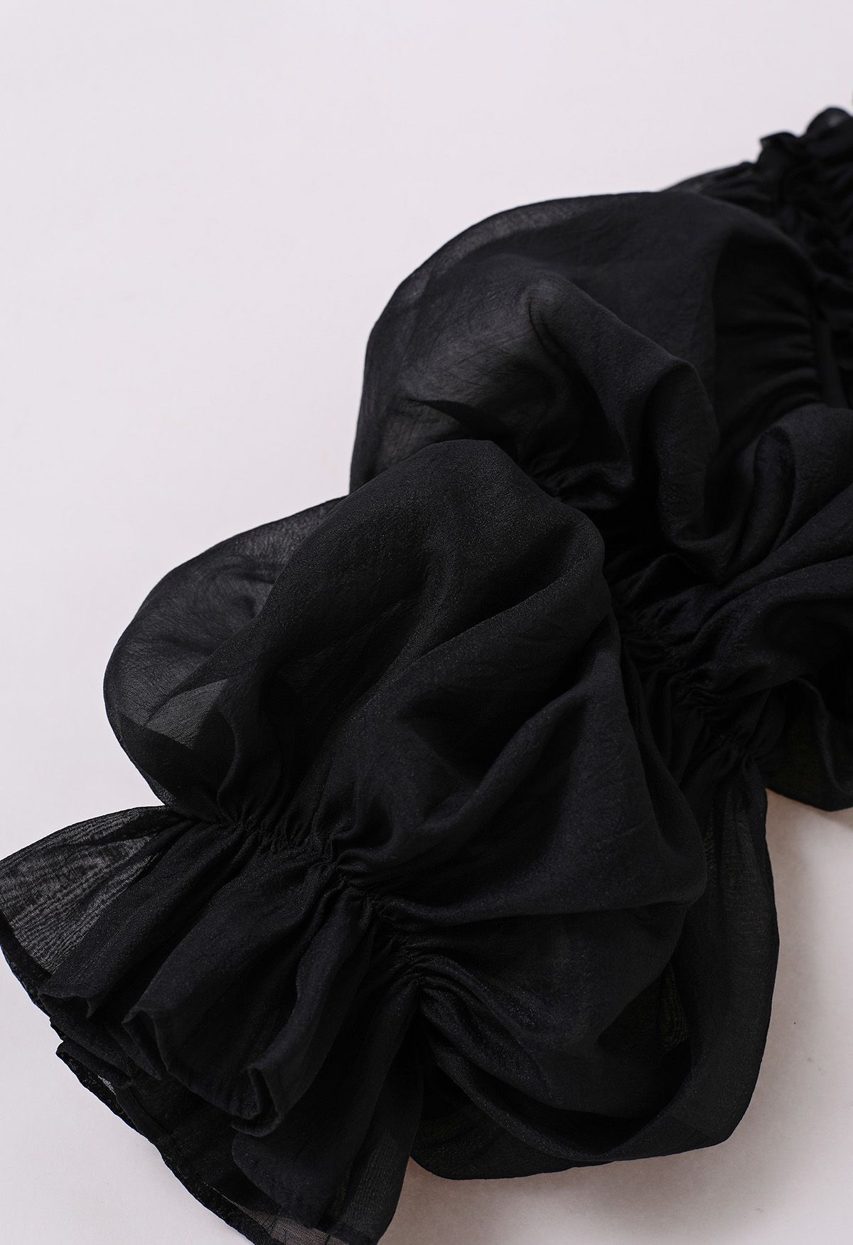 Bubble Sleeve Ruffle Trim Chiffon Spliced Crop Top in Black