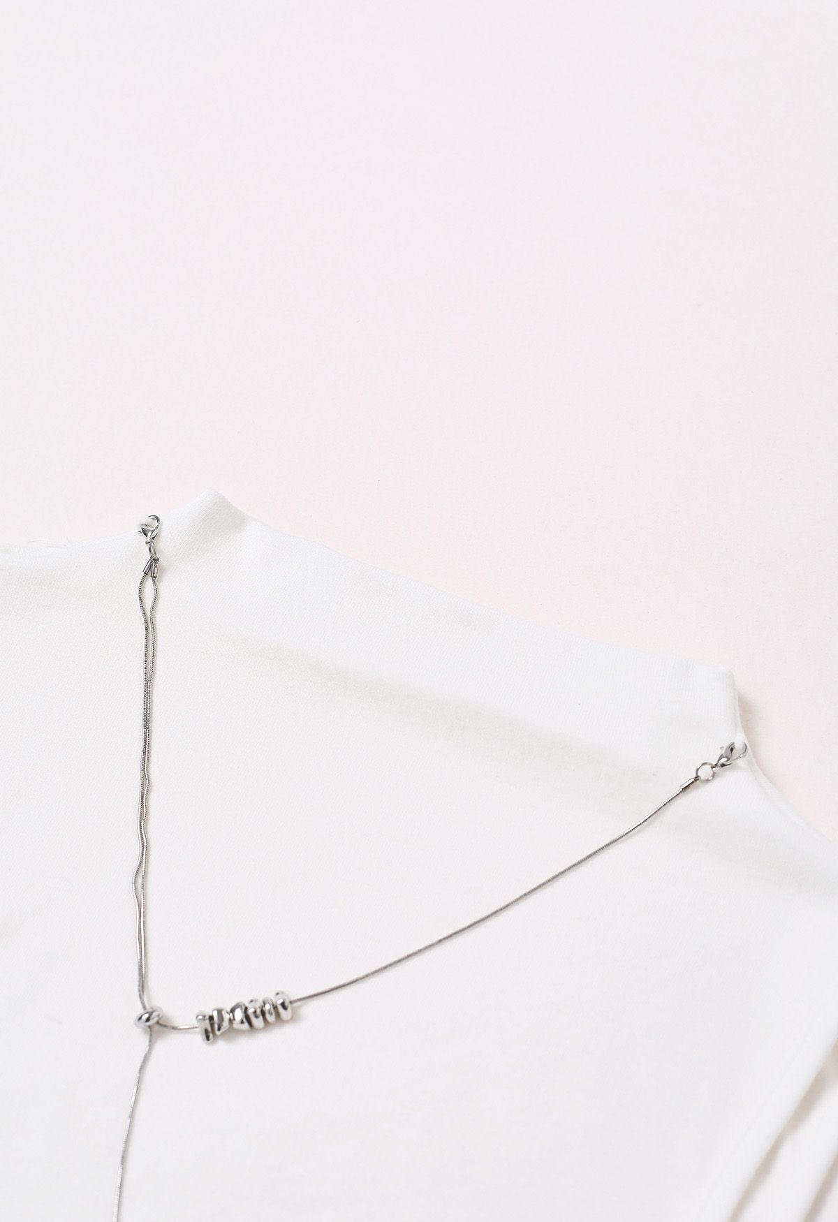 Detachable Necklace Adorned Asymmetric Sleeveless Top in White