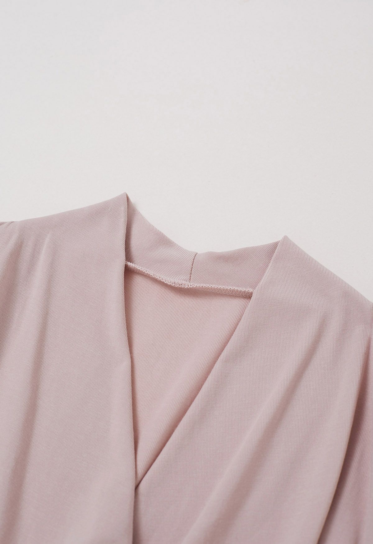 Faux-Wrap Short Sleeve Asymmetric Top in Dusty Pink