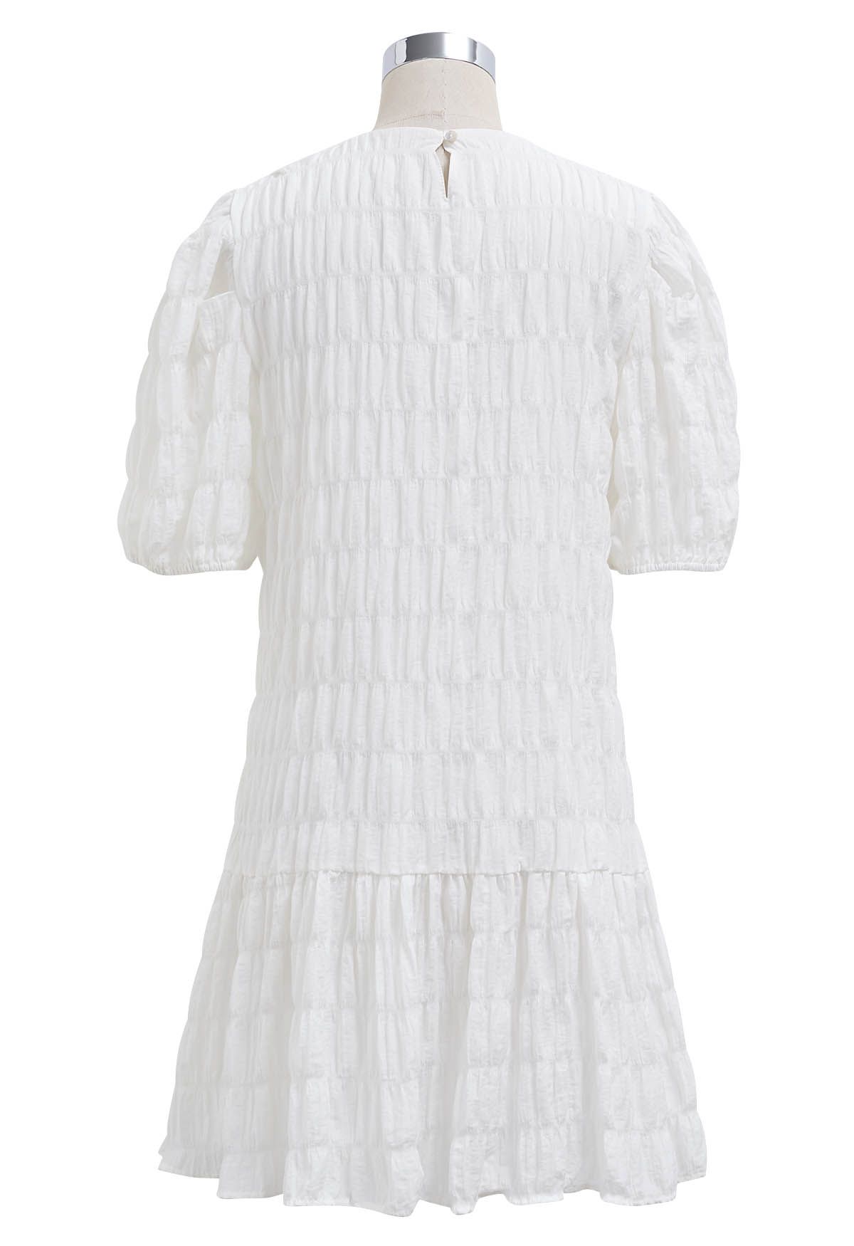 Flowing Embossed Pleat Detail Mini Dress in White