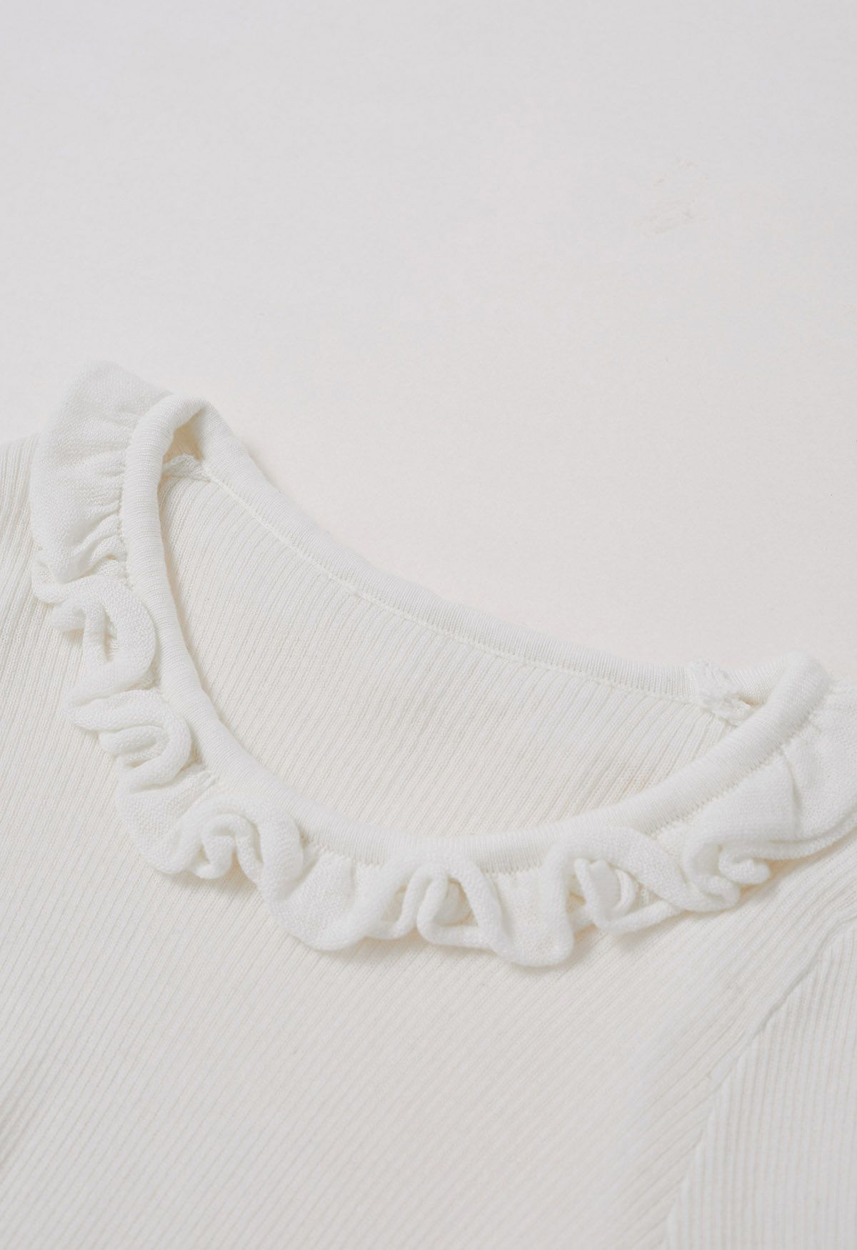 Ruffled Charm Long-Sleeve Ribbed Knit Top in White