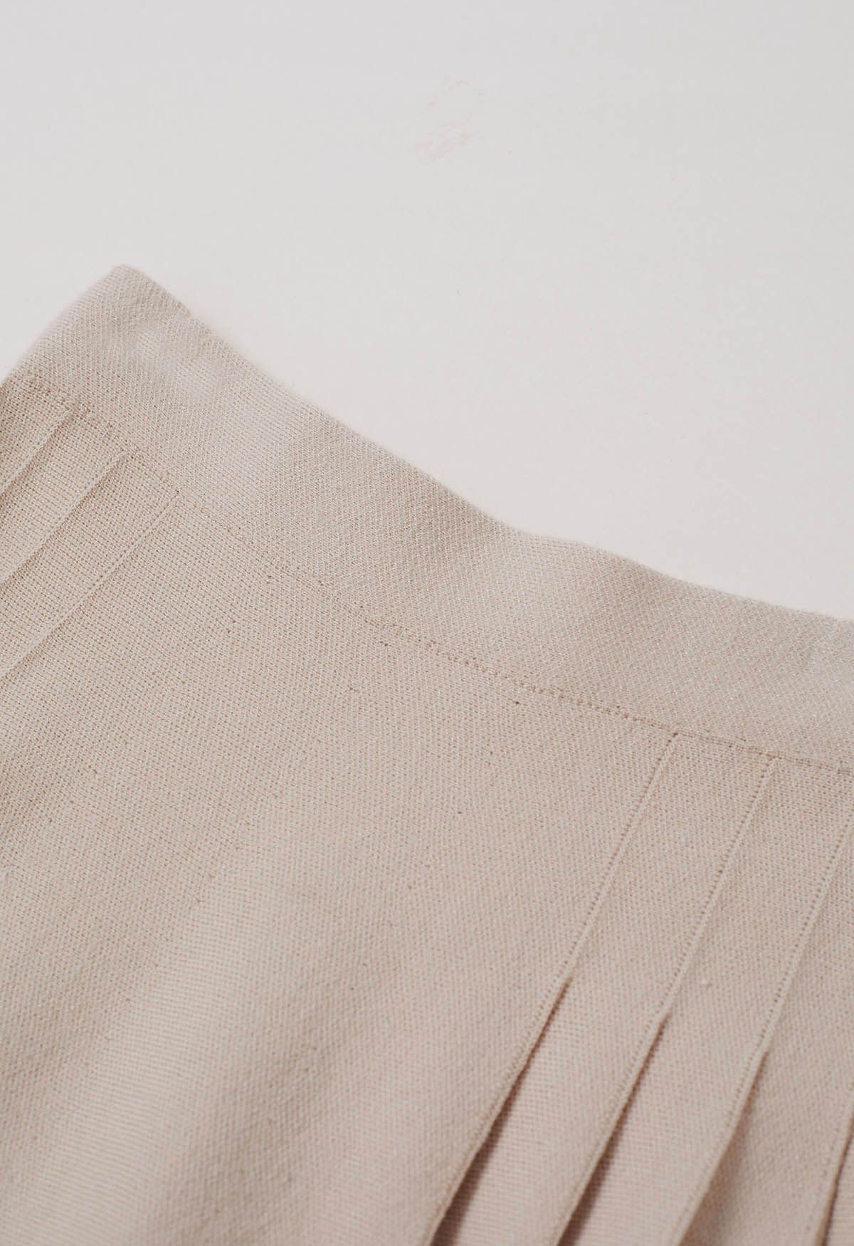 Side Pleats Knit Mini Skirt in Light Tan