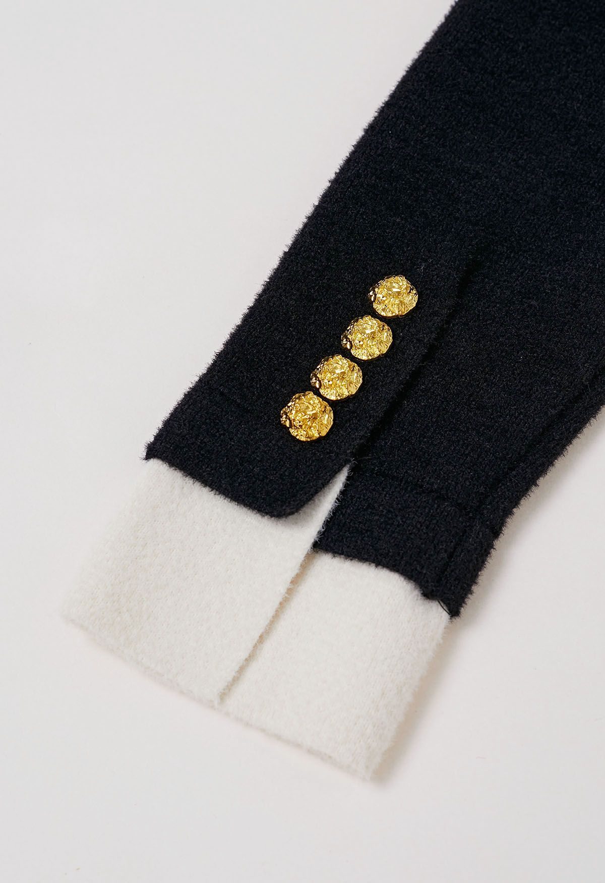 Eye-Catching Golden Stud Button Contrast Knit Cardigan in Black