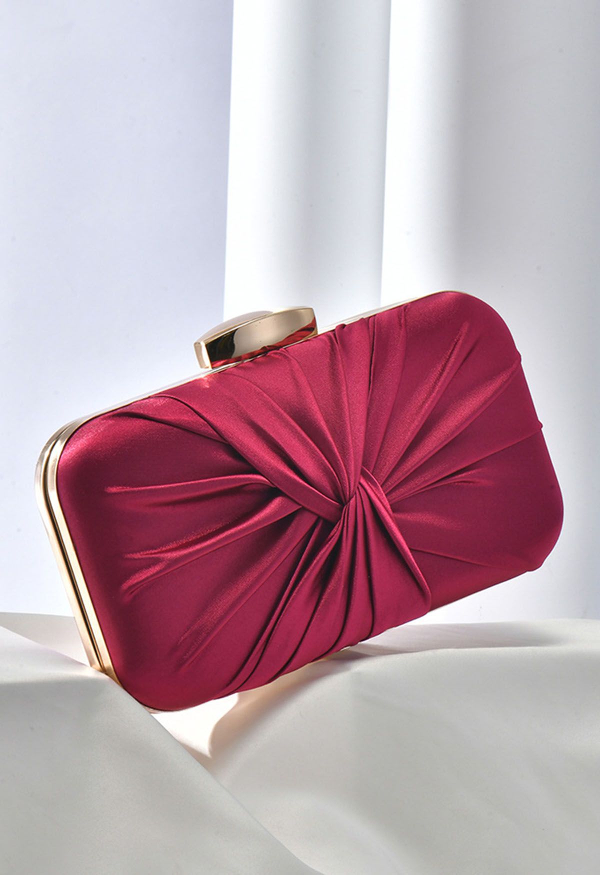 Ruched Knotted Satin Clutch in Burgundy