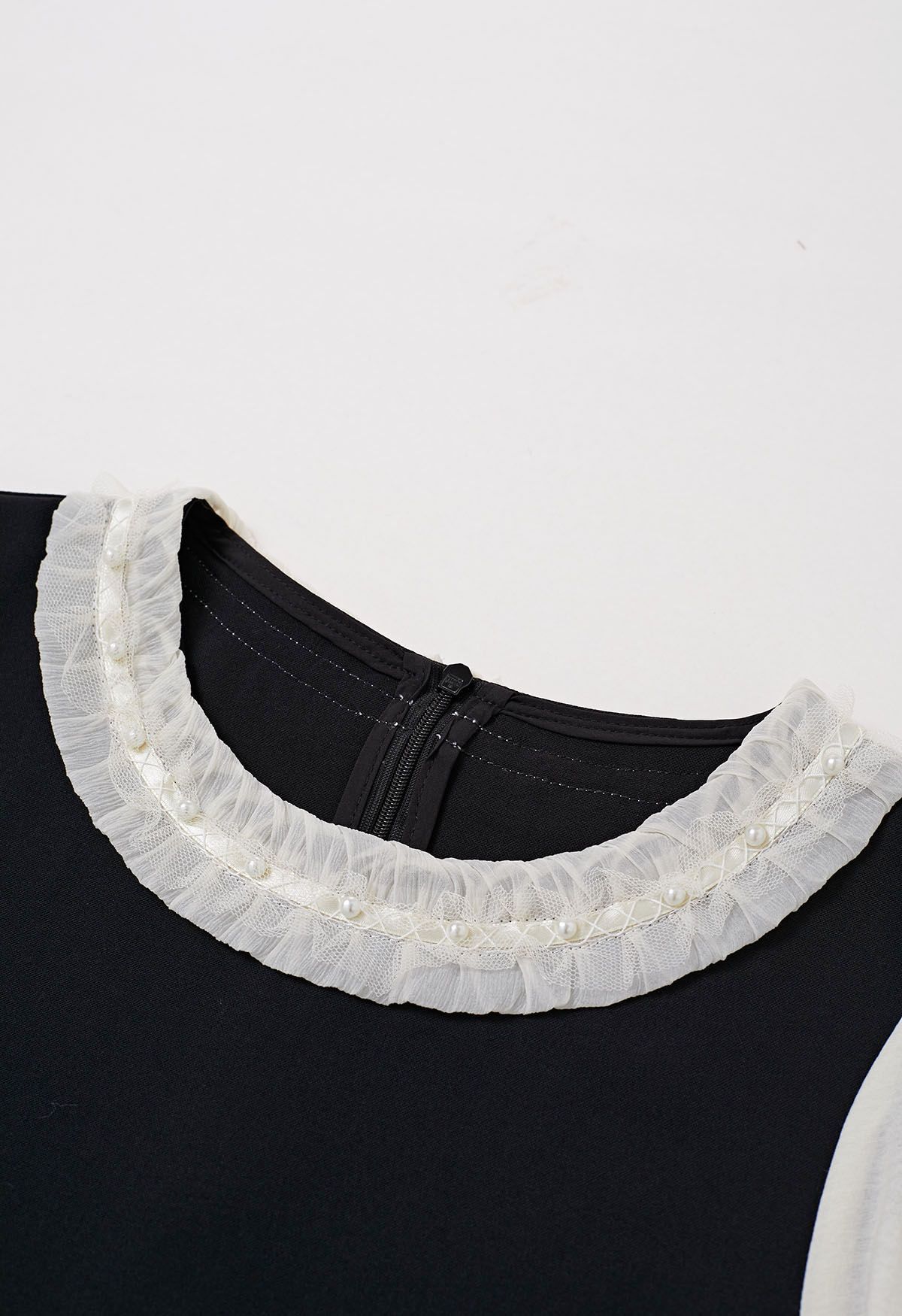 Contrast Pearl Trim Ruffle Neck Flare Cuff Top in Black