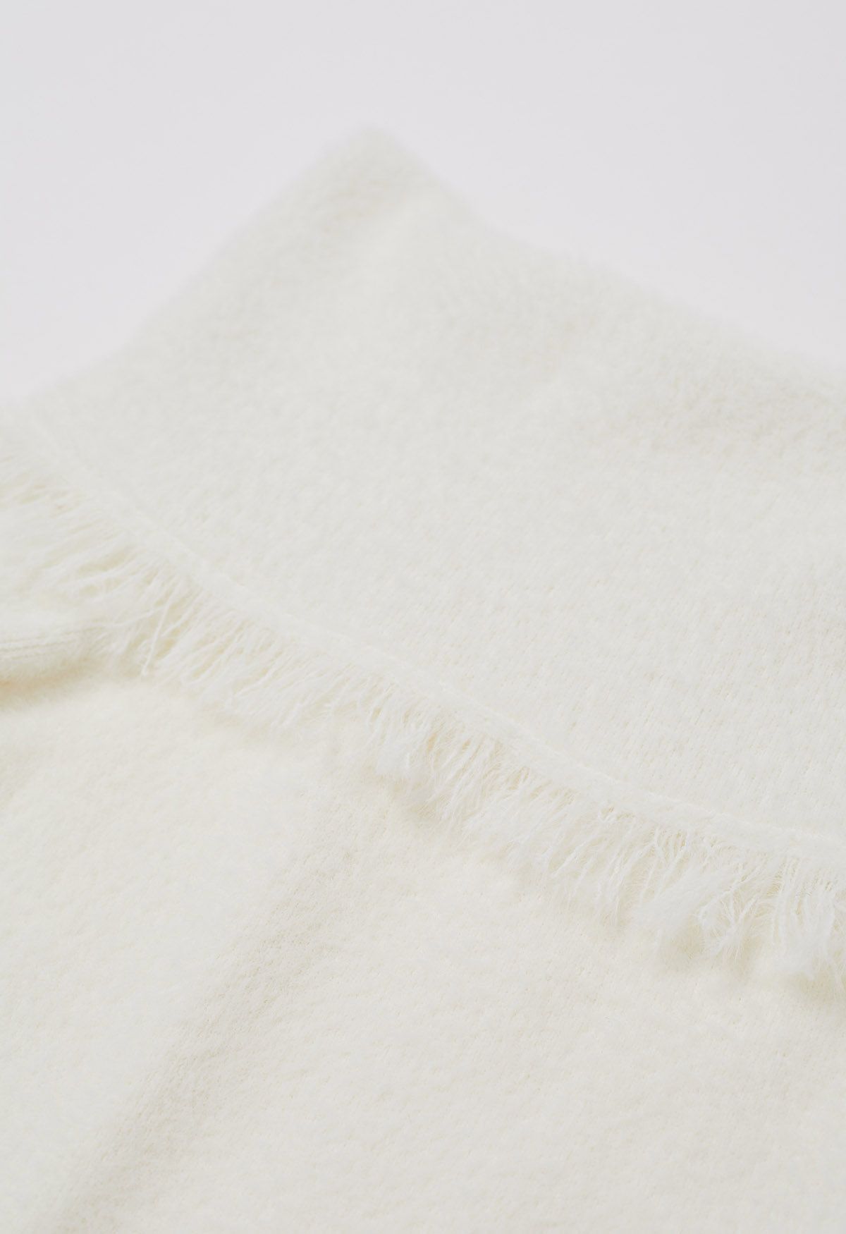 Tassel Folded Off-Shoulder Fuzzy Knit Top in Ivory