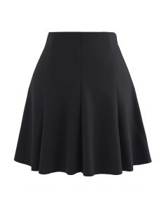 Raw-Cut Hem Flare Mini Skirt in Black