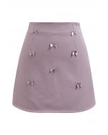 Little Bows Adorned Mini Skirt in Mauve