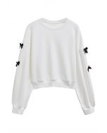 Bowknot Adorned Sleeve Cropped Sweatshirt in White