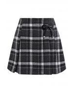 Bowknot Decorated Plaid Mini Skirt in Black